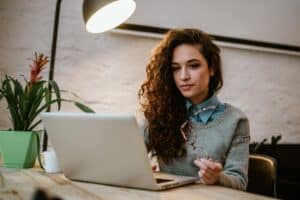 Girl student working on laptop